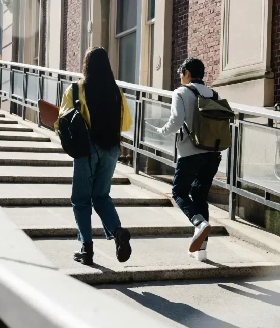 Students walking up stairs
