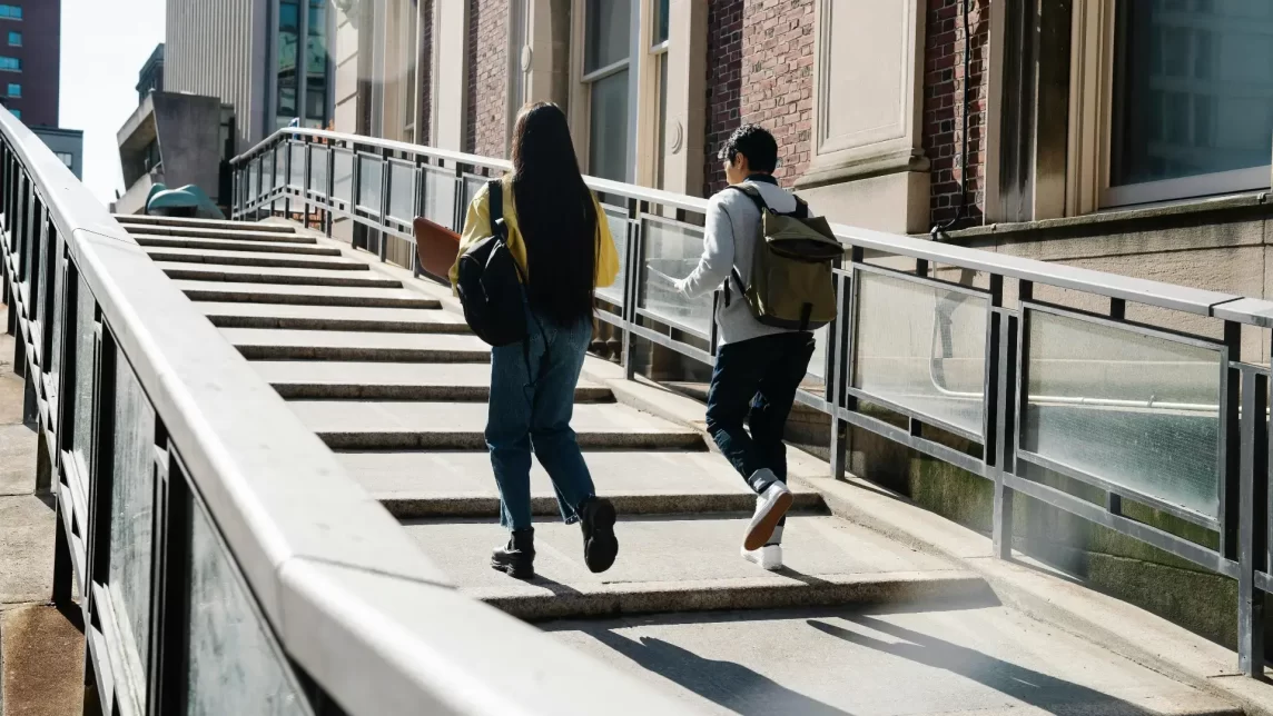 Students walking up stairs