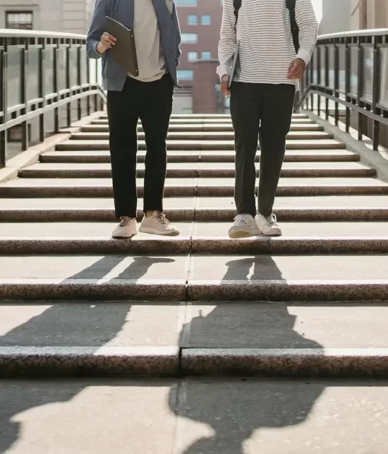 Student's walking down university steps