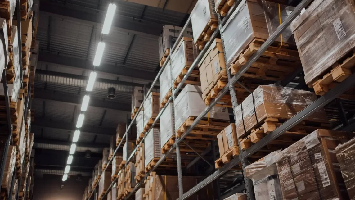 Racking aisle with fluorescent lamps